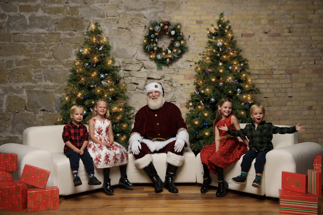 kids sitting next to Santa - Calgary mini Sessions