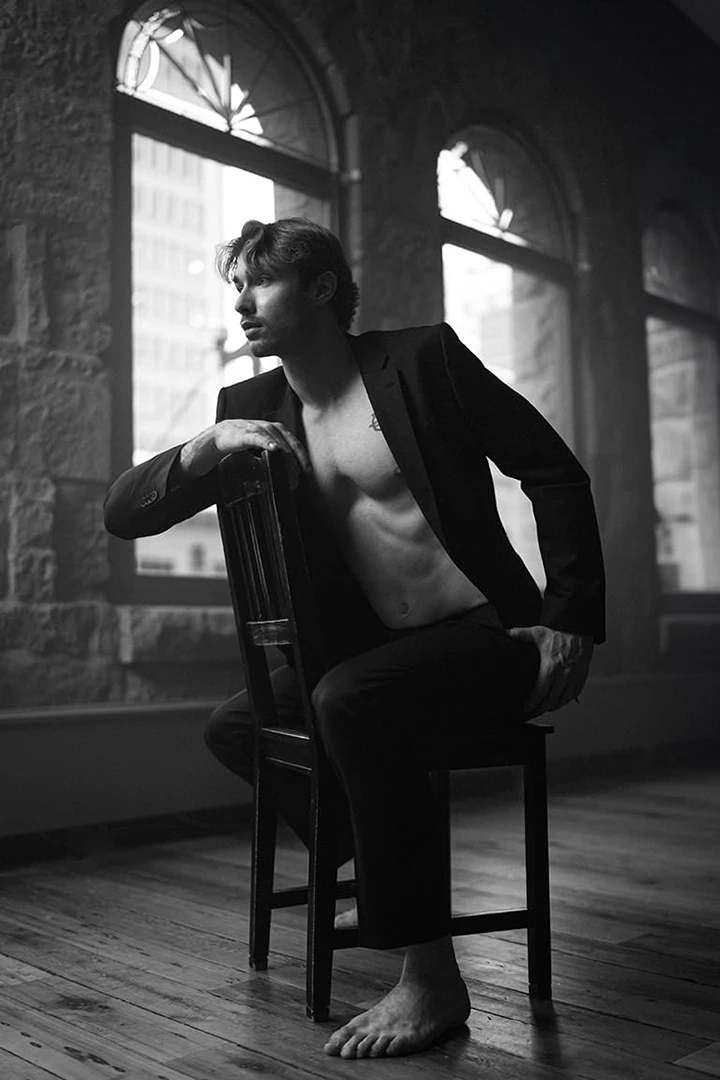 man sitting on prop chair - photo equipment for rent