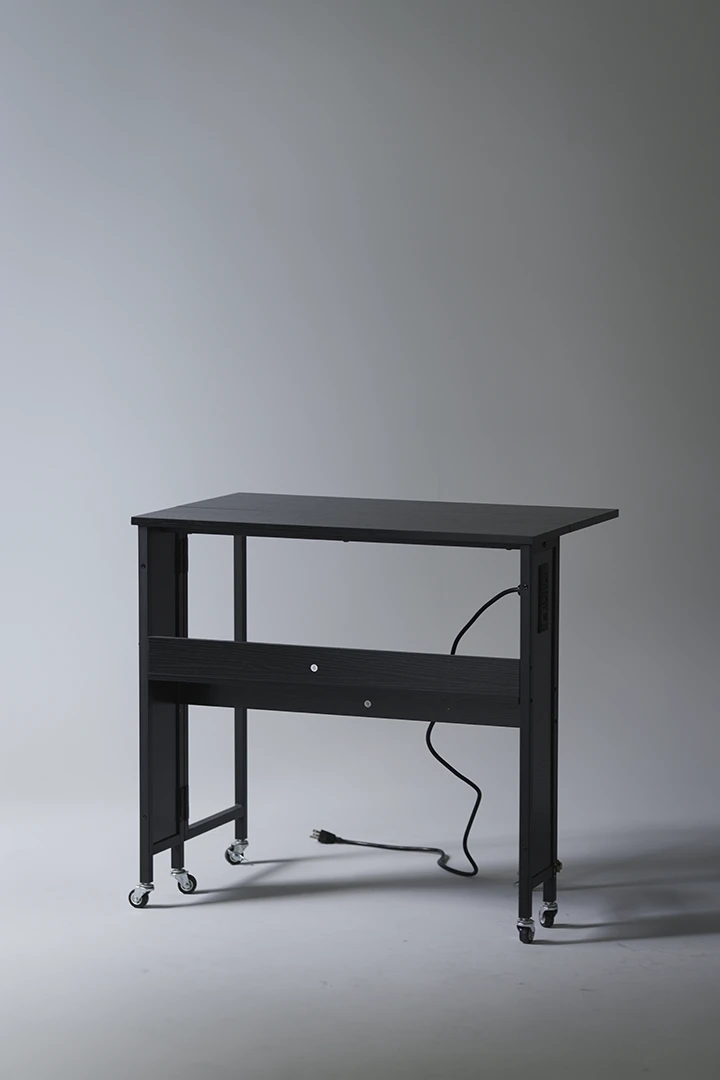 folding desk on cyc wall - photography equipment for rent