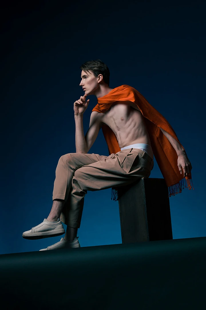 model sitting on apple box - camera gear for rent