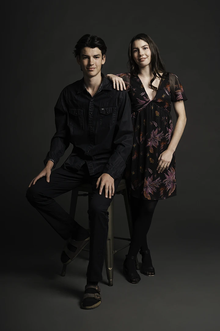 siblings posing on stool - photo equipment for rent