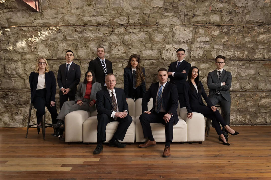 lawyer group posing on modular sofa - photo gear for rent