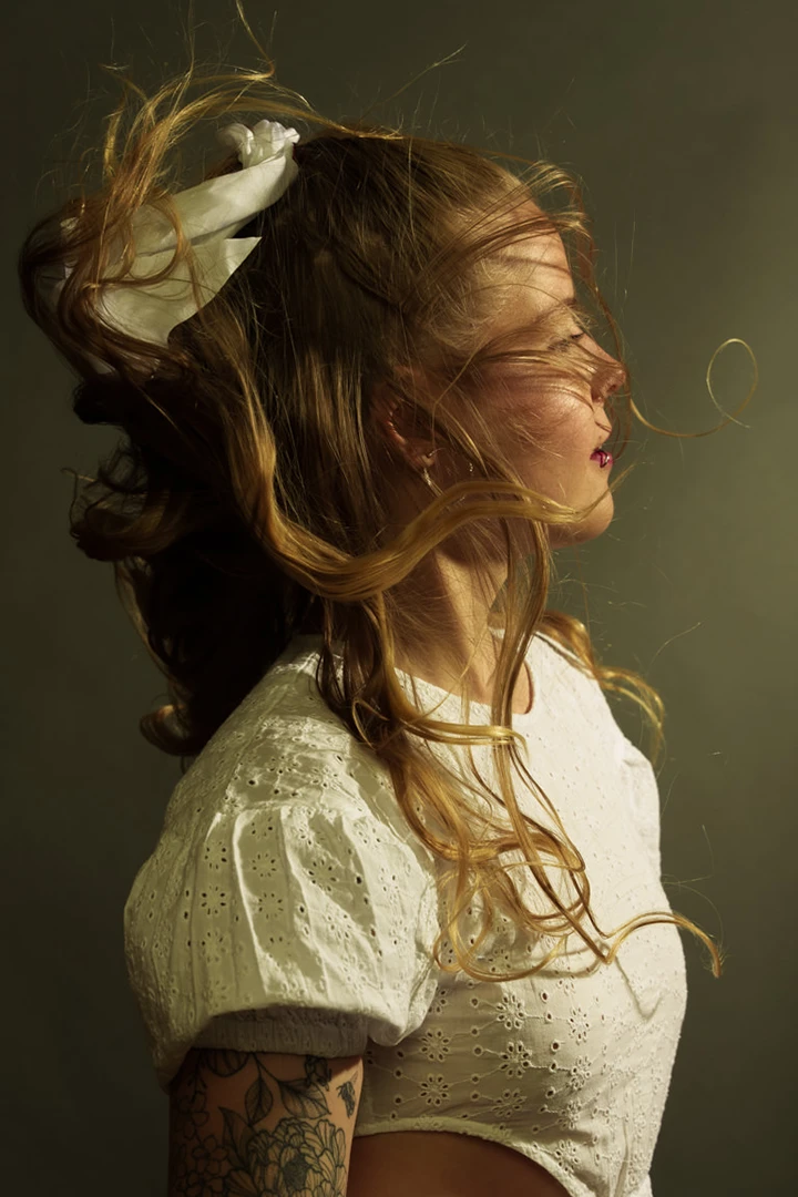 fan blowing hair - photography equipment for rent