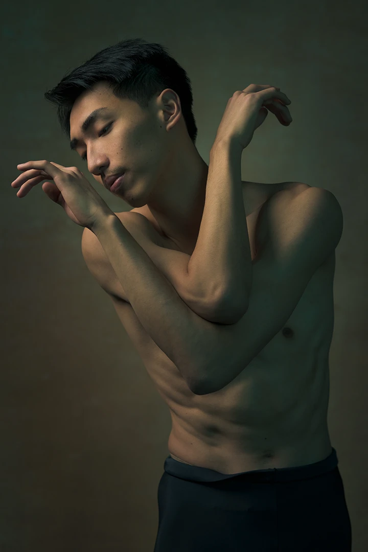 portrait of dancer in pose - photo studio
