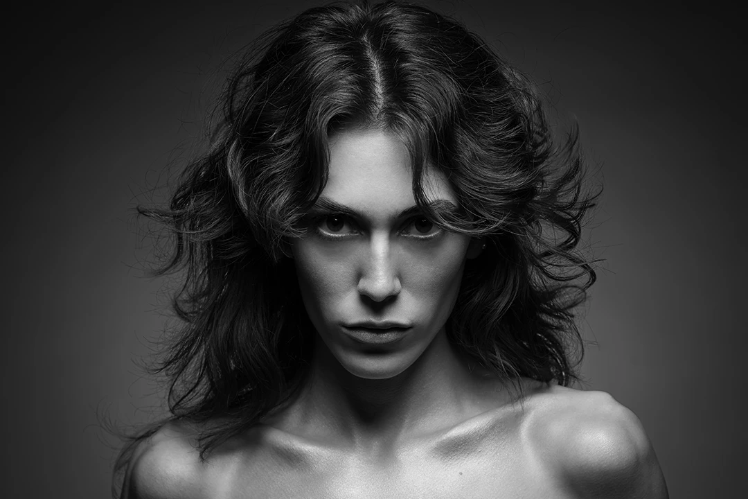dramatic fashion portrait of model - photo studio
